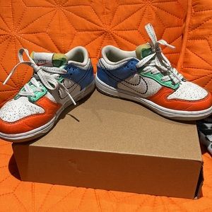 Size 1 multi color Nike. Like new only worn a few times in great condition.